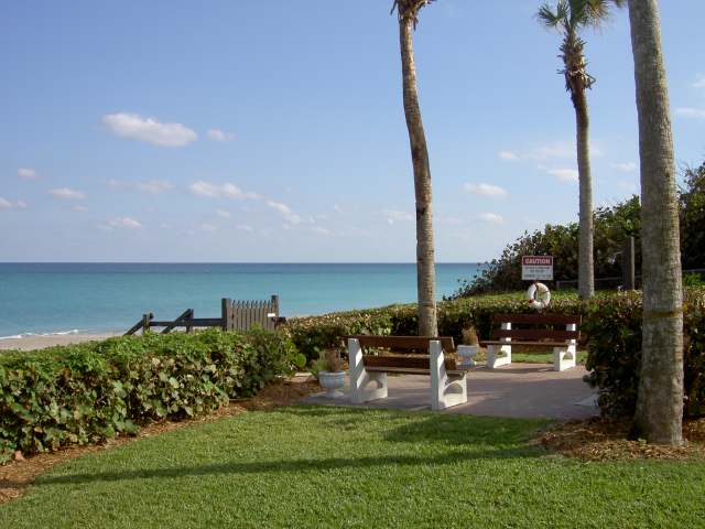 Beach access with benches and ocean view